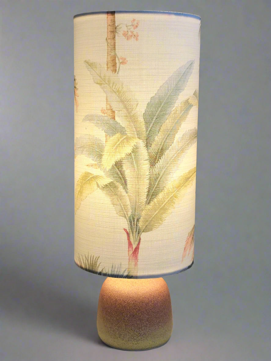 Decorative lamp with floral design on a light background
