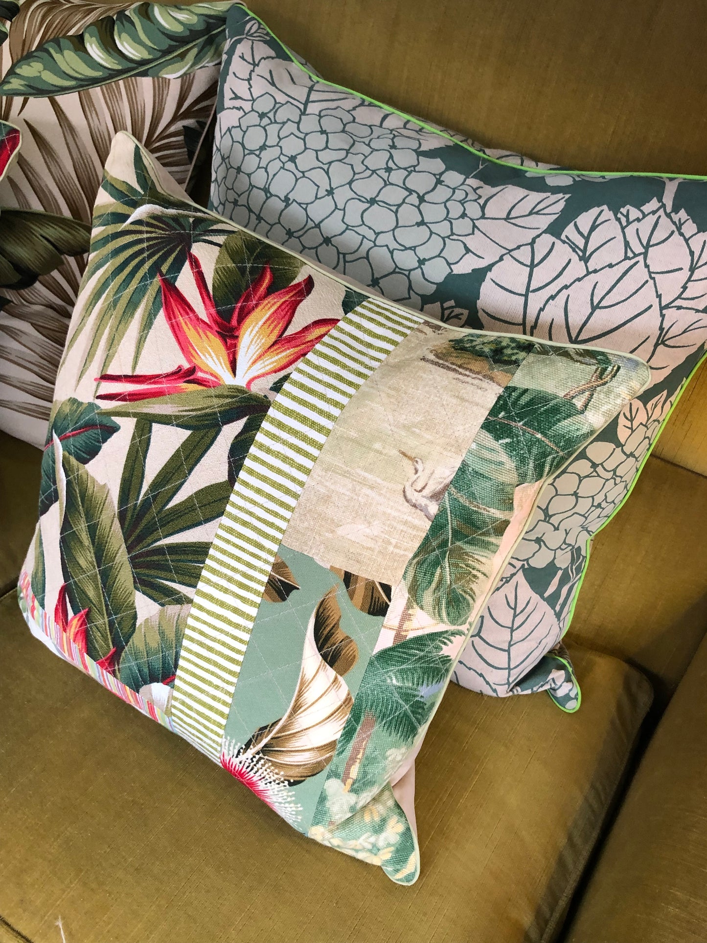 tropical patchwork quilted cushion