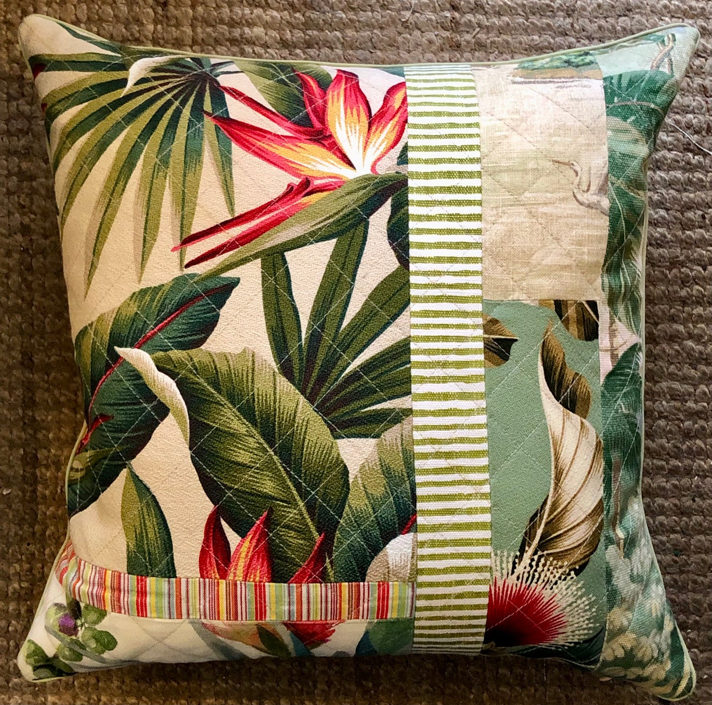 tropical patchwork quilted cushion