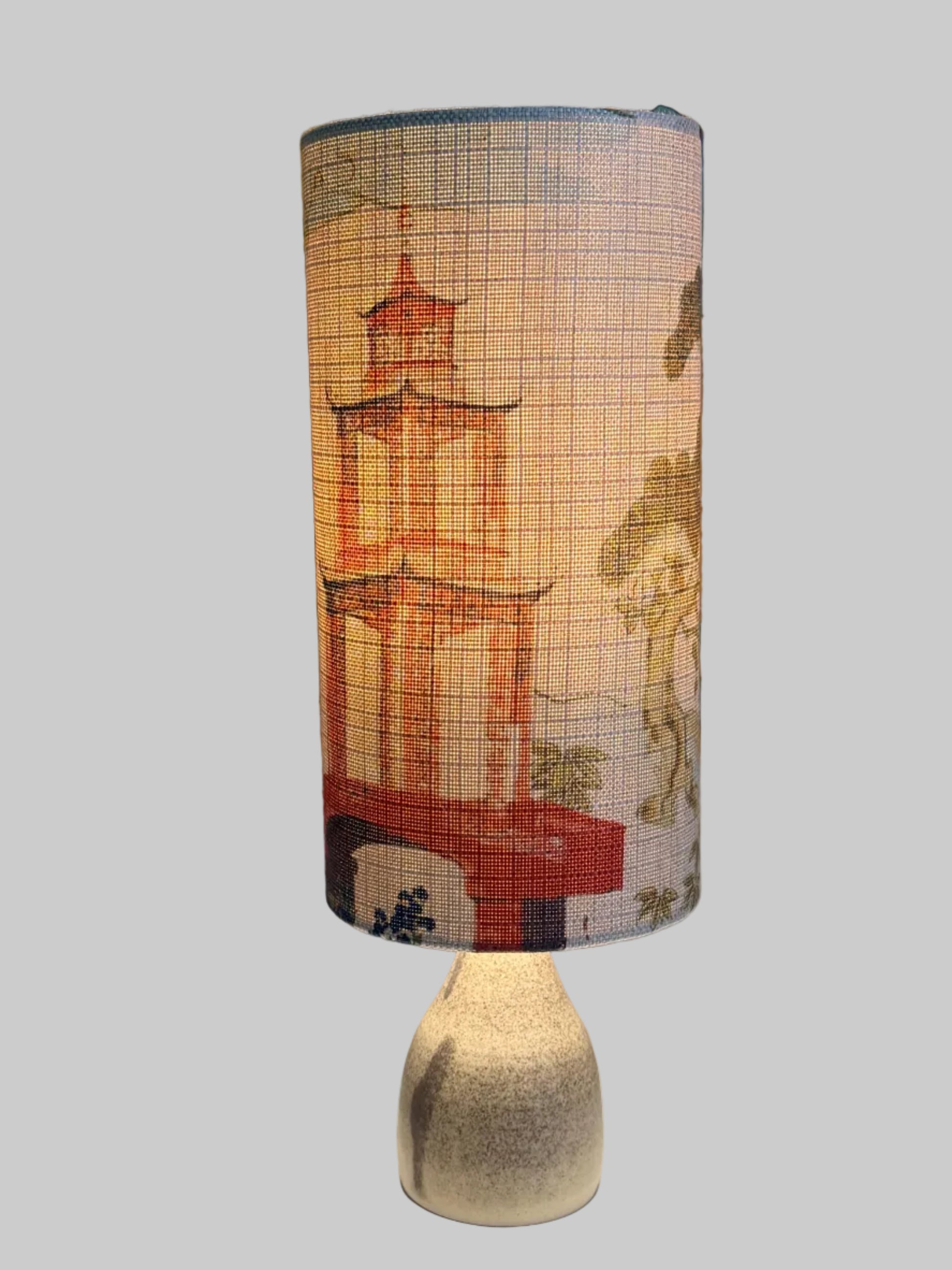 shinto temple and ginseng lampshade on a crackle glaze aj hand
thrown lamp base