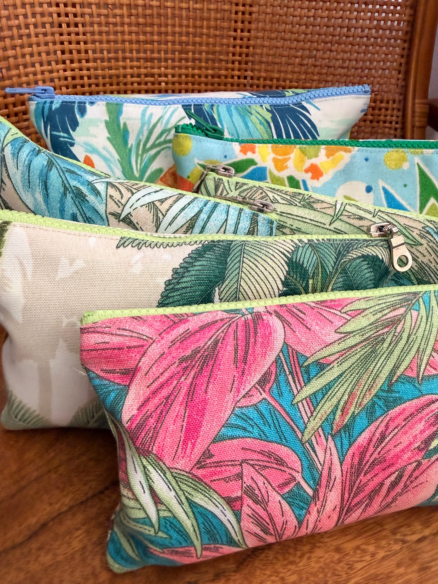Colorful tropical-themed wetbag pouches