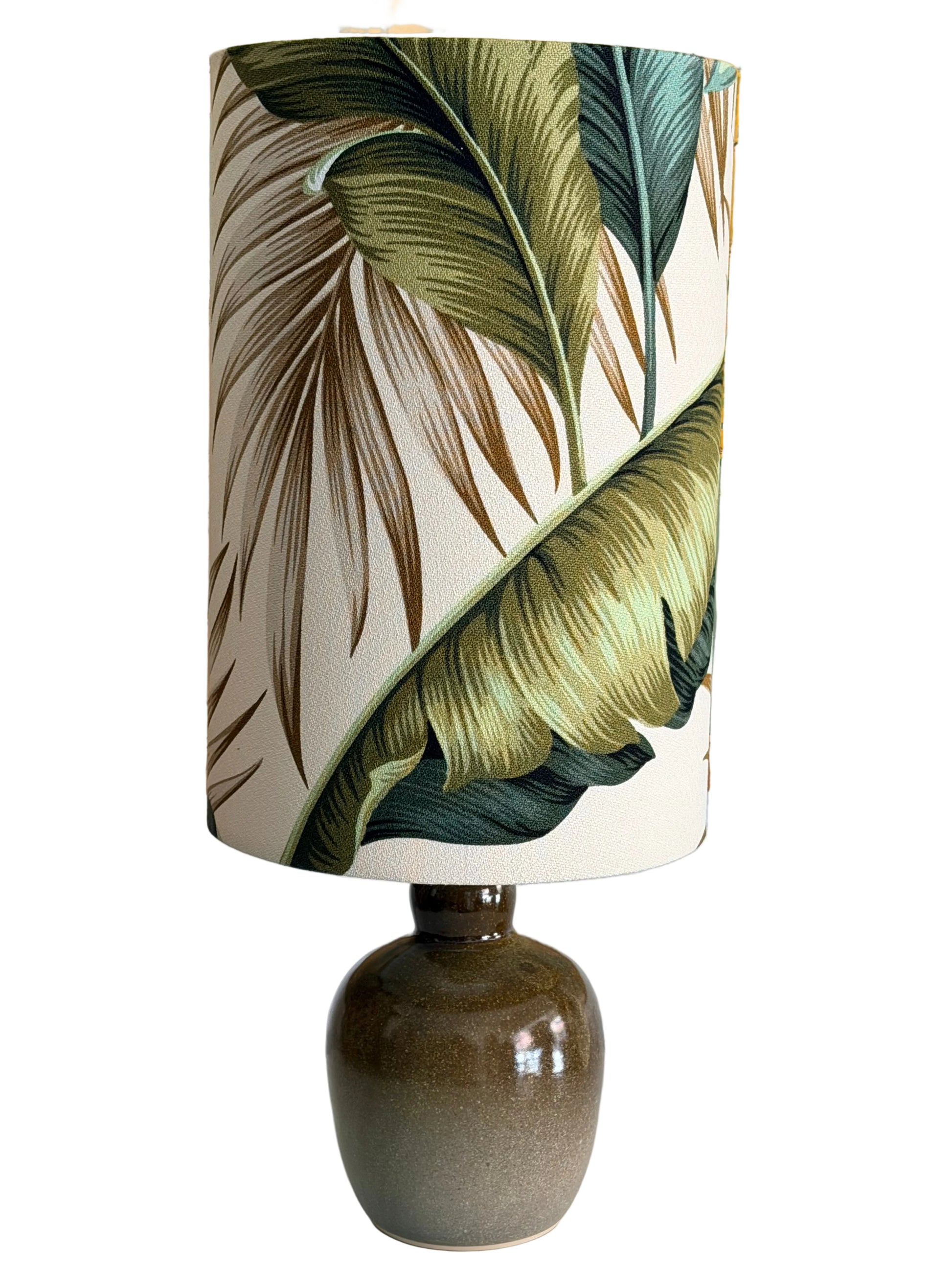 handthrown khaki aj lamp with banana leaf lampshade