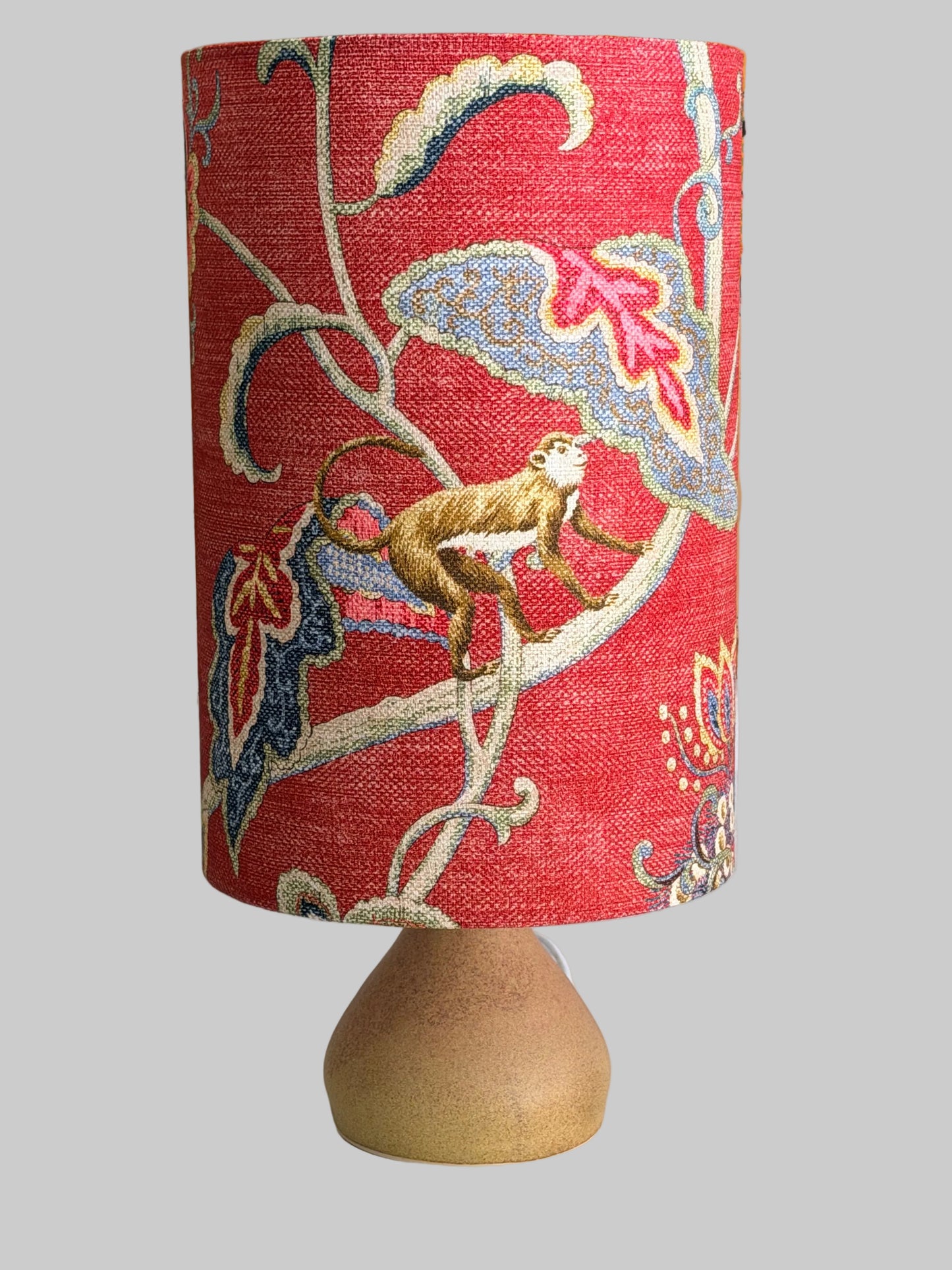 aj lamp  handthrown with raspberry monkey lamp shade