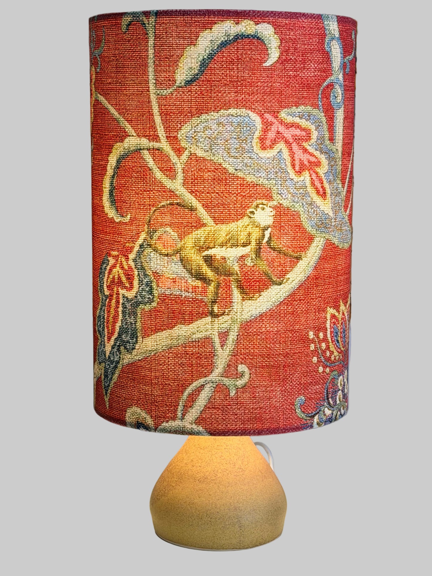 aj lamp  handthrown with raspberry monkey lamp shade