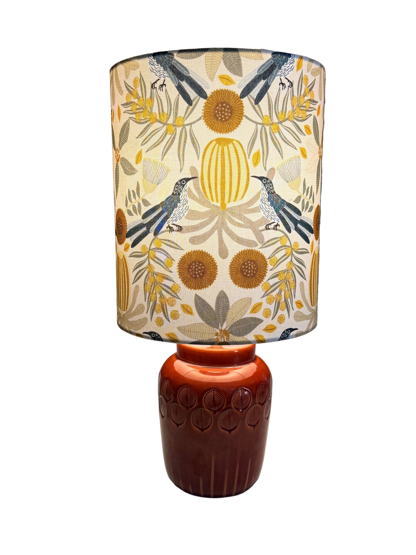 italian brick coloured base with australiana lampshade featuring bamnksia and wattle birds