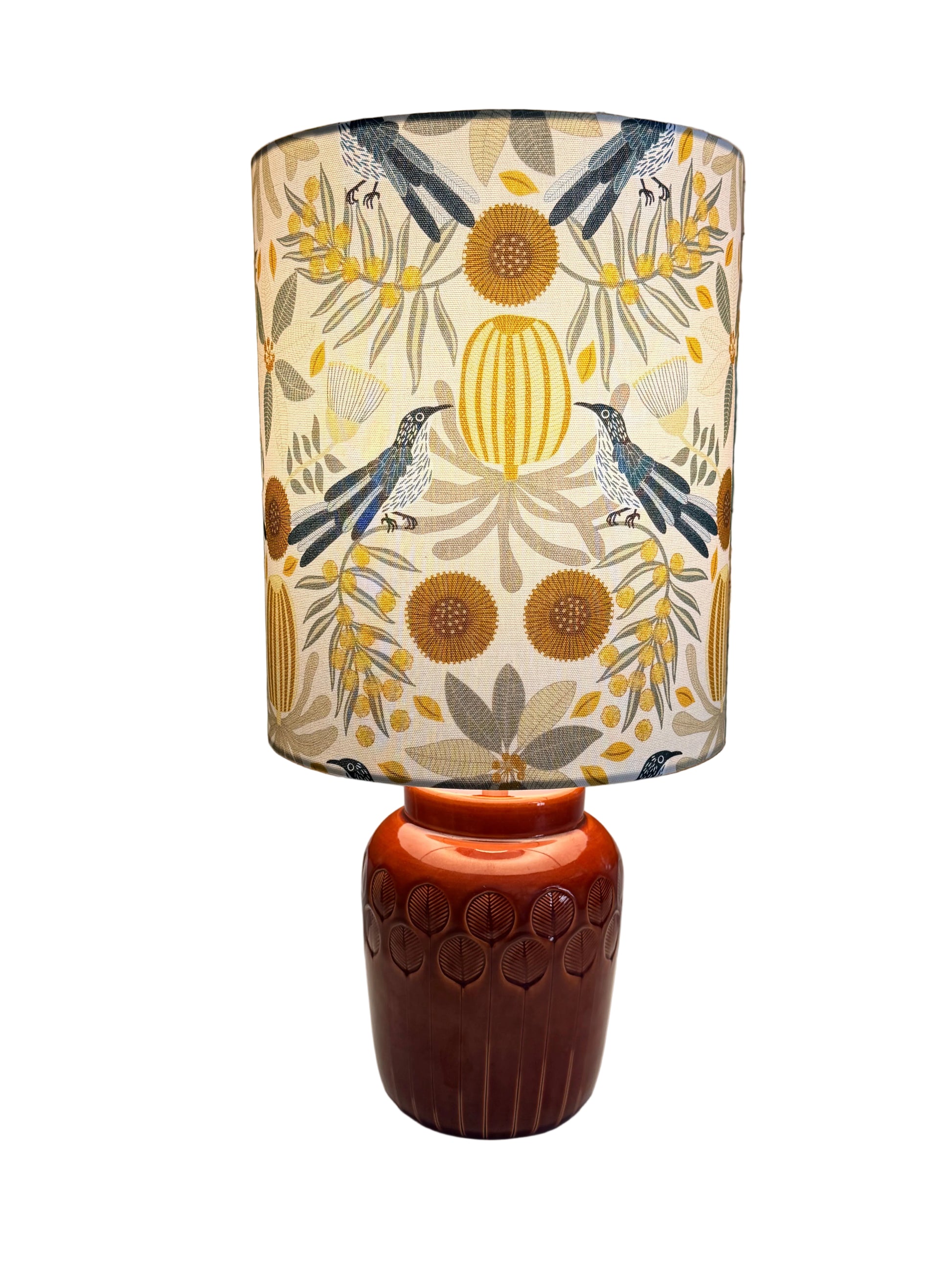 italian brick coloured base with australiana lampshade featuring bamnksia and wattle birds