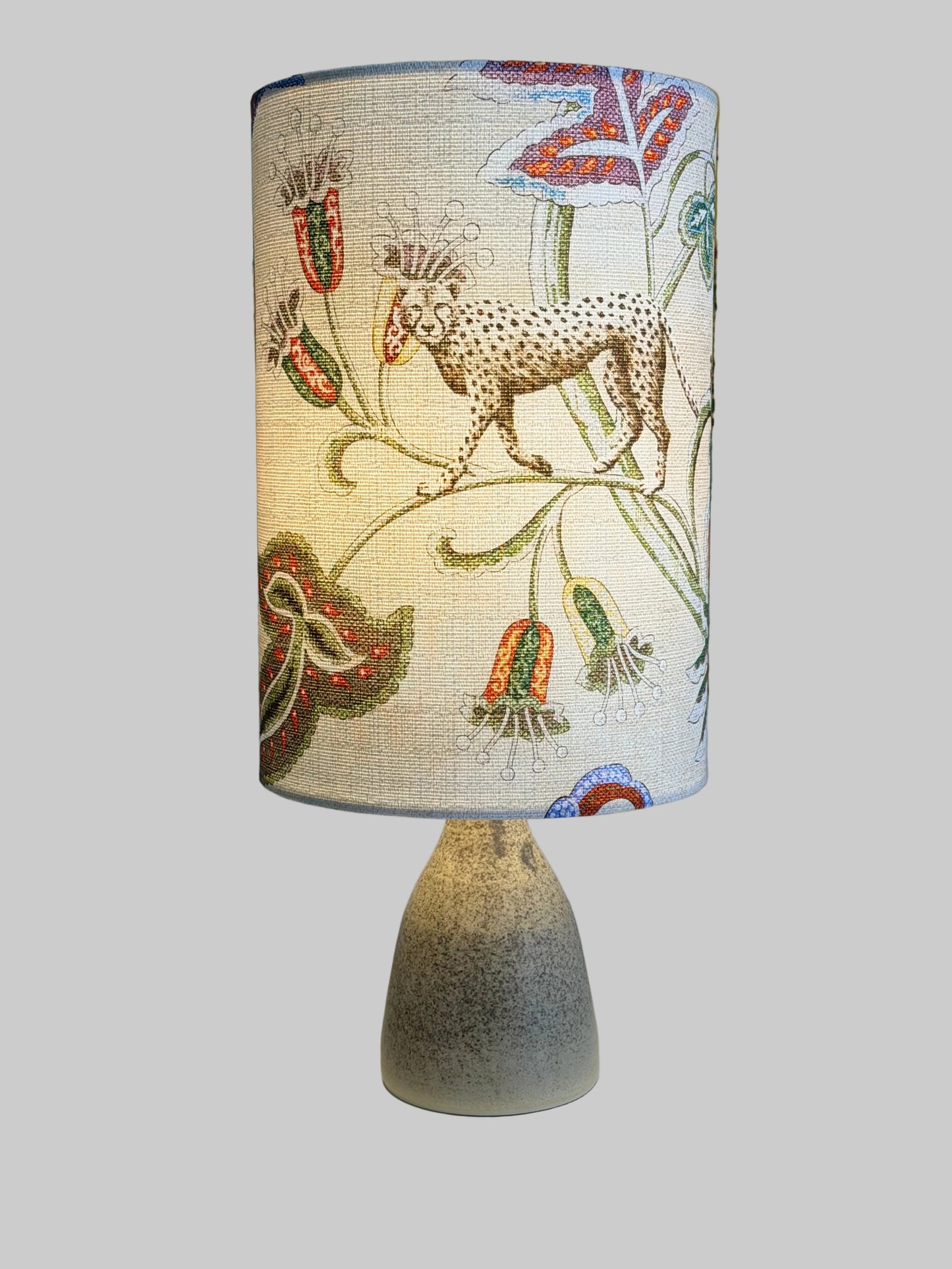aj handthrown table lamp with leopard lampshade