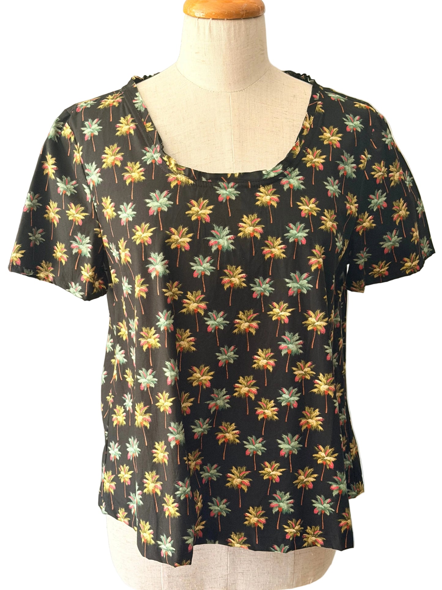 black mini palm tree top