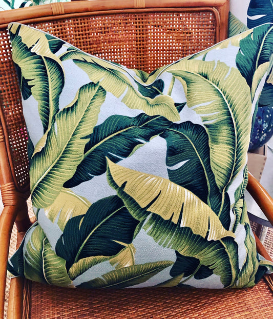 Silver banana leaf piped cushion