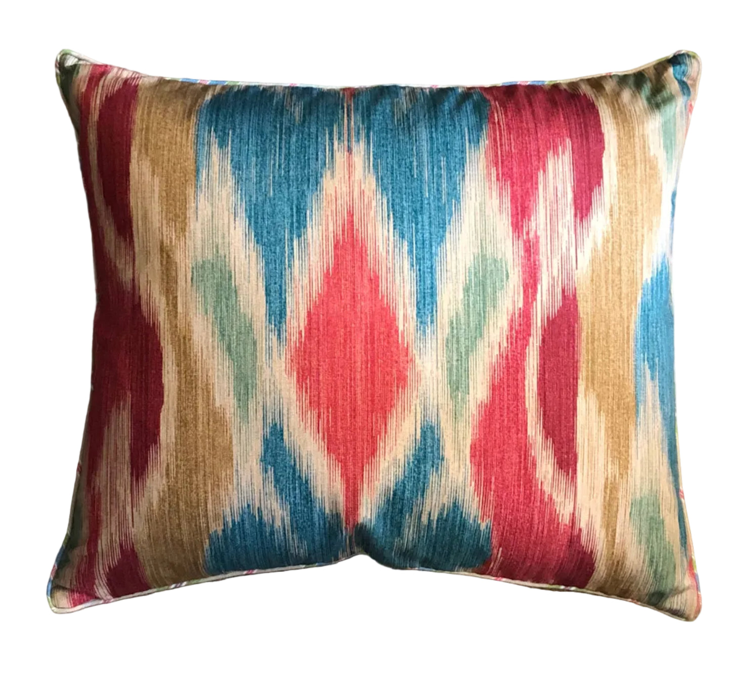 carnival ikat piped cushion