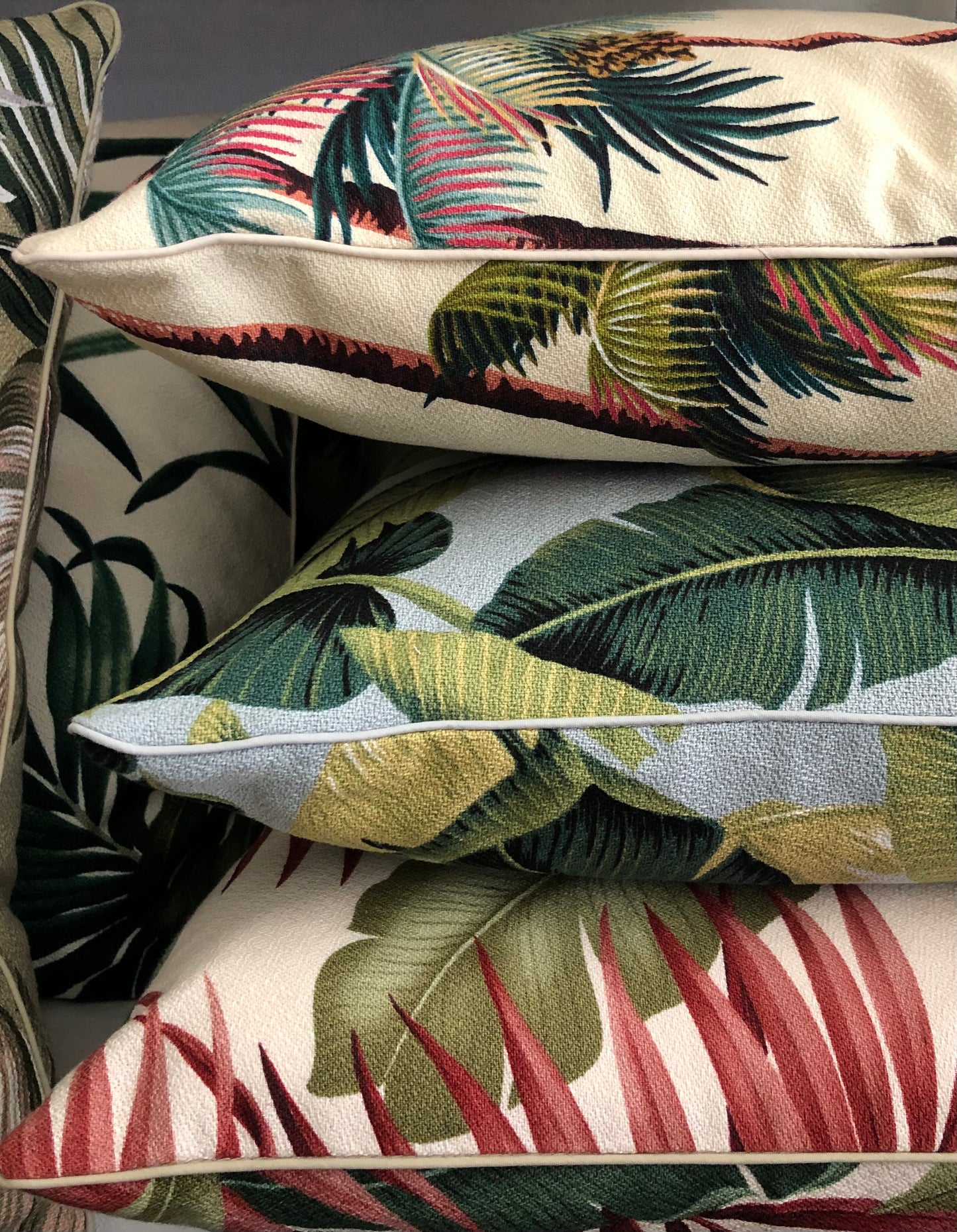 Silver banana leaf piped cushion