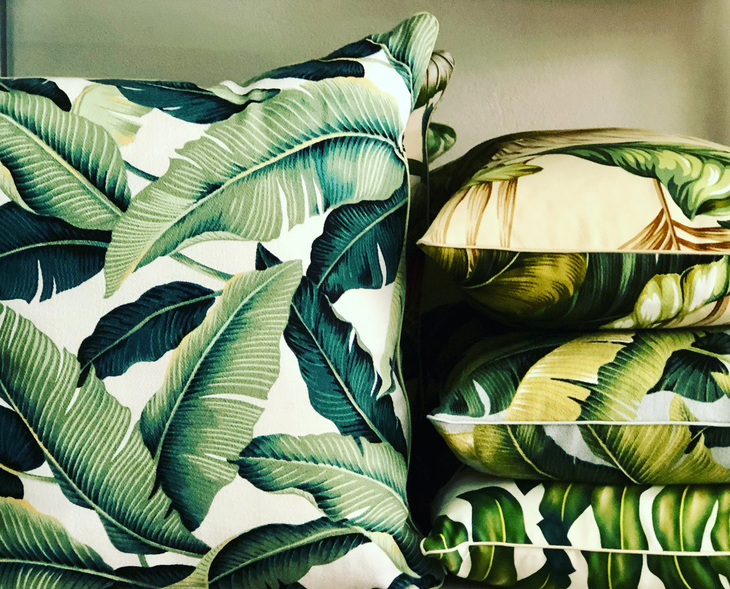 Sage banana leaf piped cushion