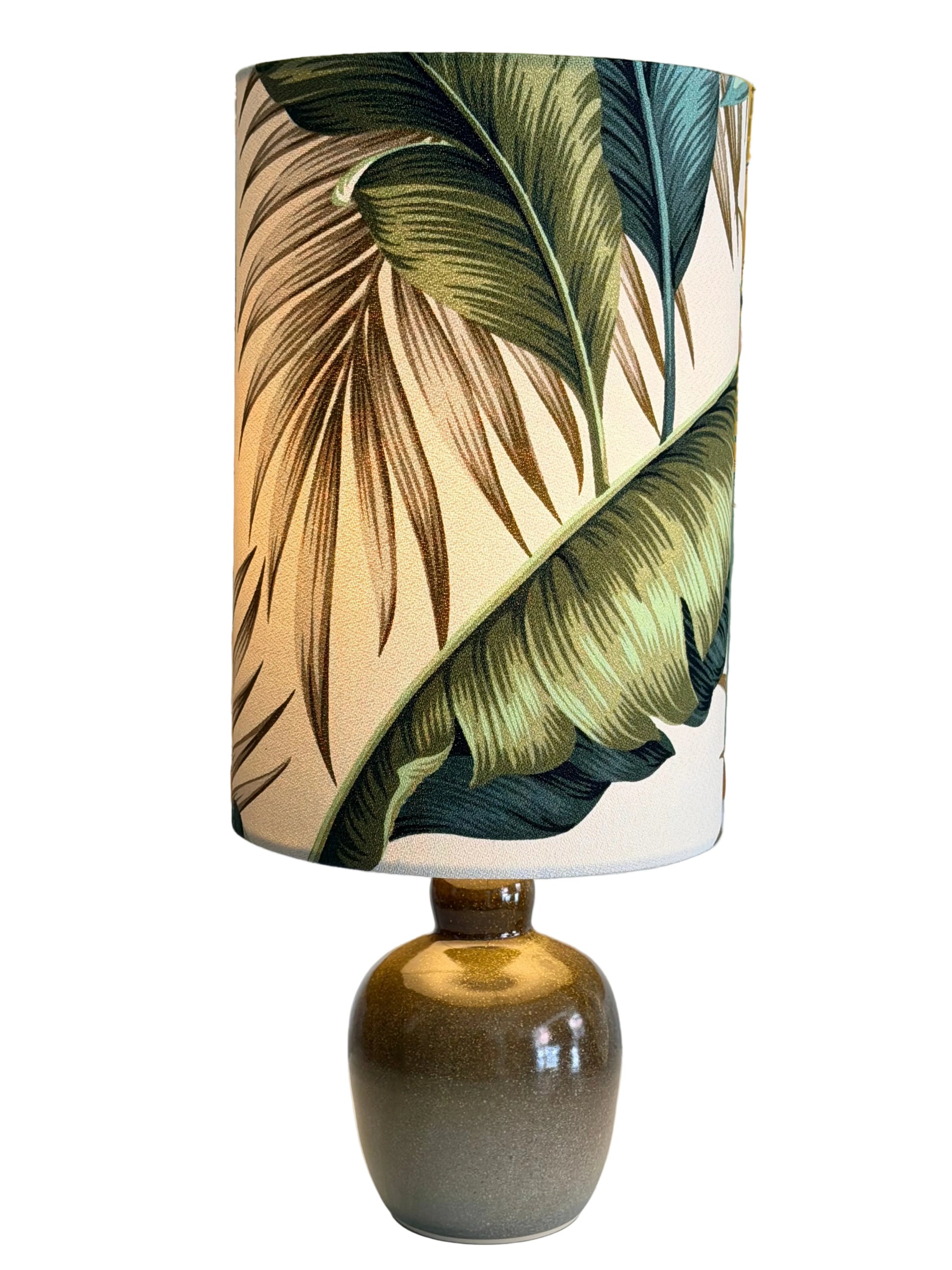 handthrown khaki aj lamp with banana leaf lampshade