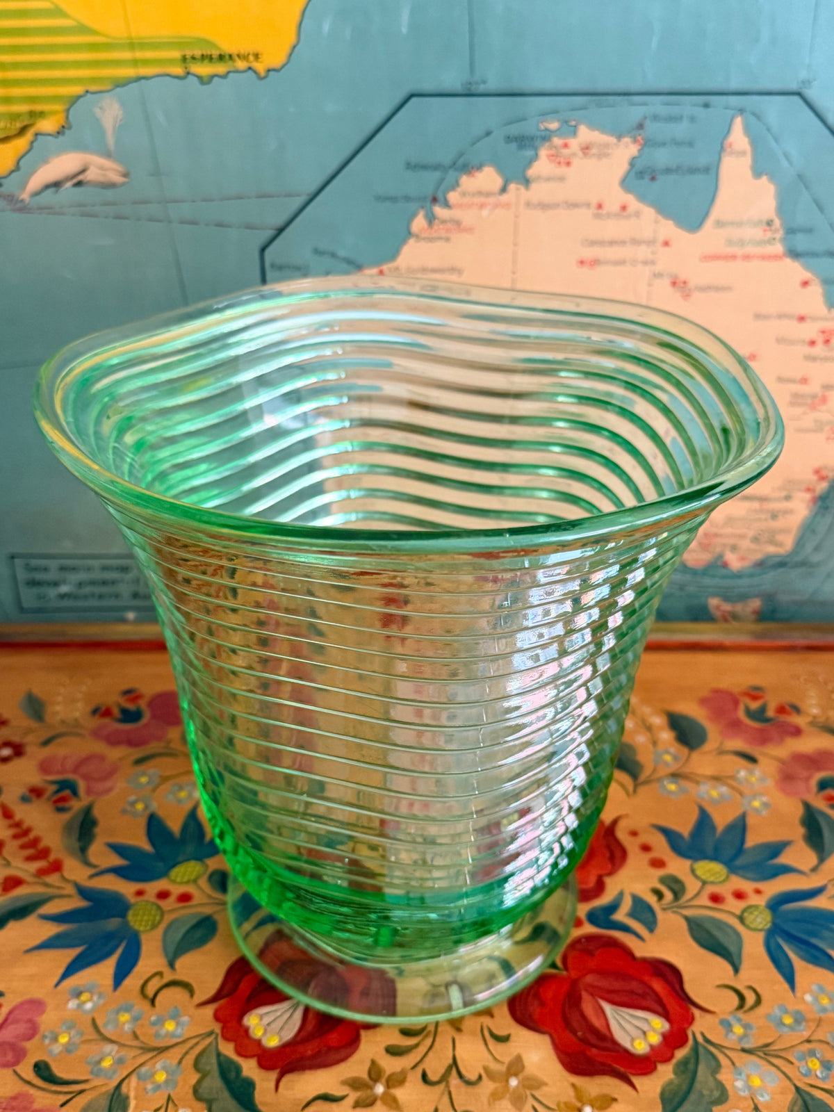 A  vintage translucent green ribbed glass vase 